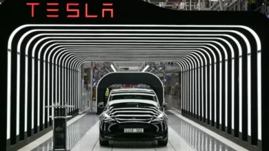 Perang Artificial Intelligence pada Roda Empat: Saat Grok Tesla Ditantang Kepungan Naga China